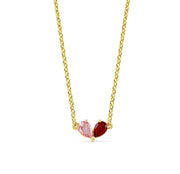 Elegant birthstone Toi et Moi necklace with ruby blaze and pink tourmaline in pear cuts, representing two souls joined in harmony.